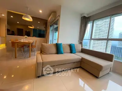 Spacious modern living room with city view and dining area