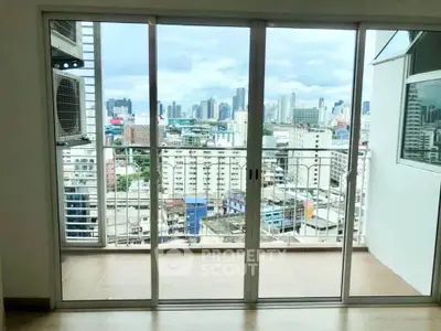 Spacious balcony with stunning city skyline view in modern apartment