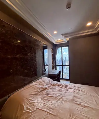 Luxurious bedroom with stunning city view and elegant decor