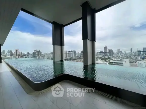 Stunning rooftop infinity pool with panoramic city skyline views