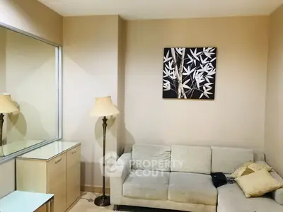 Cozy living room with modern decor and comfortable sofa