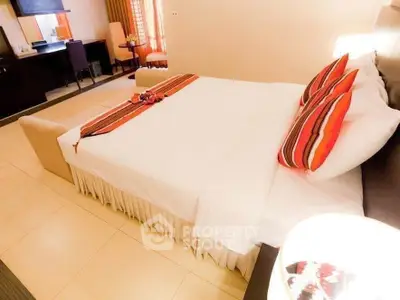 Elegant bedroom with stylish decor and cozy ambiance