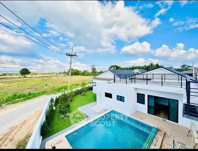Stunning modern home with private pool and rooftop terrace, offering serene countryside views.
