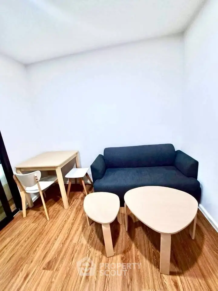 Cozy living room with modern furniture and wooden flooring