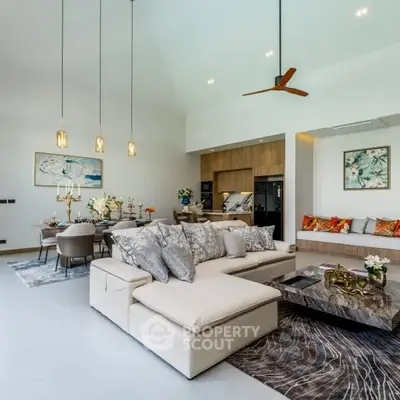 Luxurious open-plan living room with elegant decor and modern furnishings