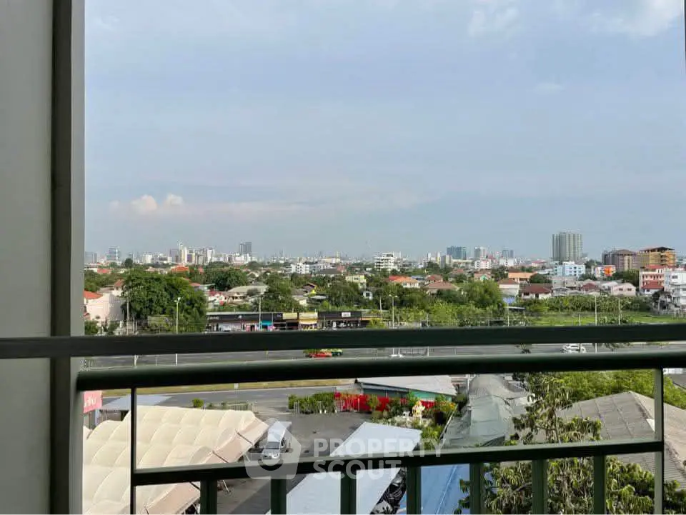 Stunning cityscape view from a modern balcony, perfect for urban living.
