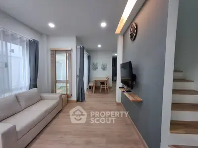 Modern living room with sleek design and natural light