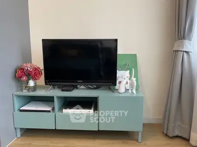 Stylish living room with modern TV stand and decor accents