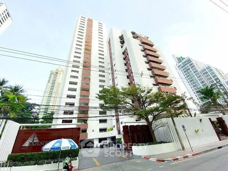Stunning high-rise building exterior with modern architecture in prime urban location.