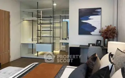 Modern bedroom with stylish decor and glass partitioned study area