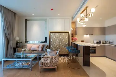Luxurious modern living room with open kitchen, elegant decor, and stylish lighting in a high-end apartment.