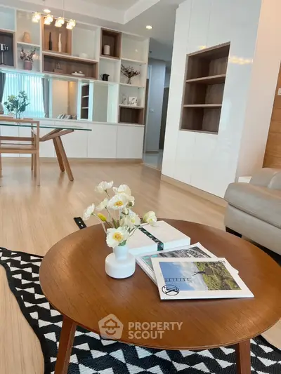 Modern living room with stylish wooden furniture and elegant decor