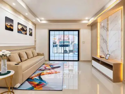 Modern living room with elegant decor and large window view