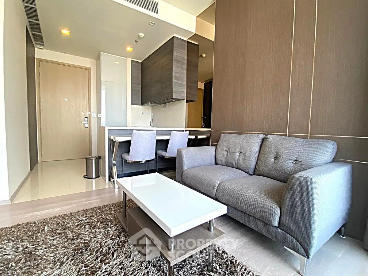Modern living room with stylish furniture and open layout in a contemporary apartment.