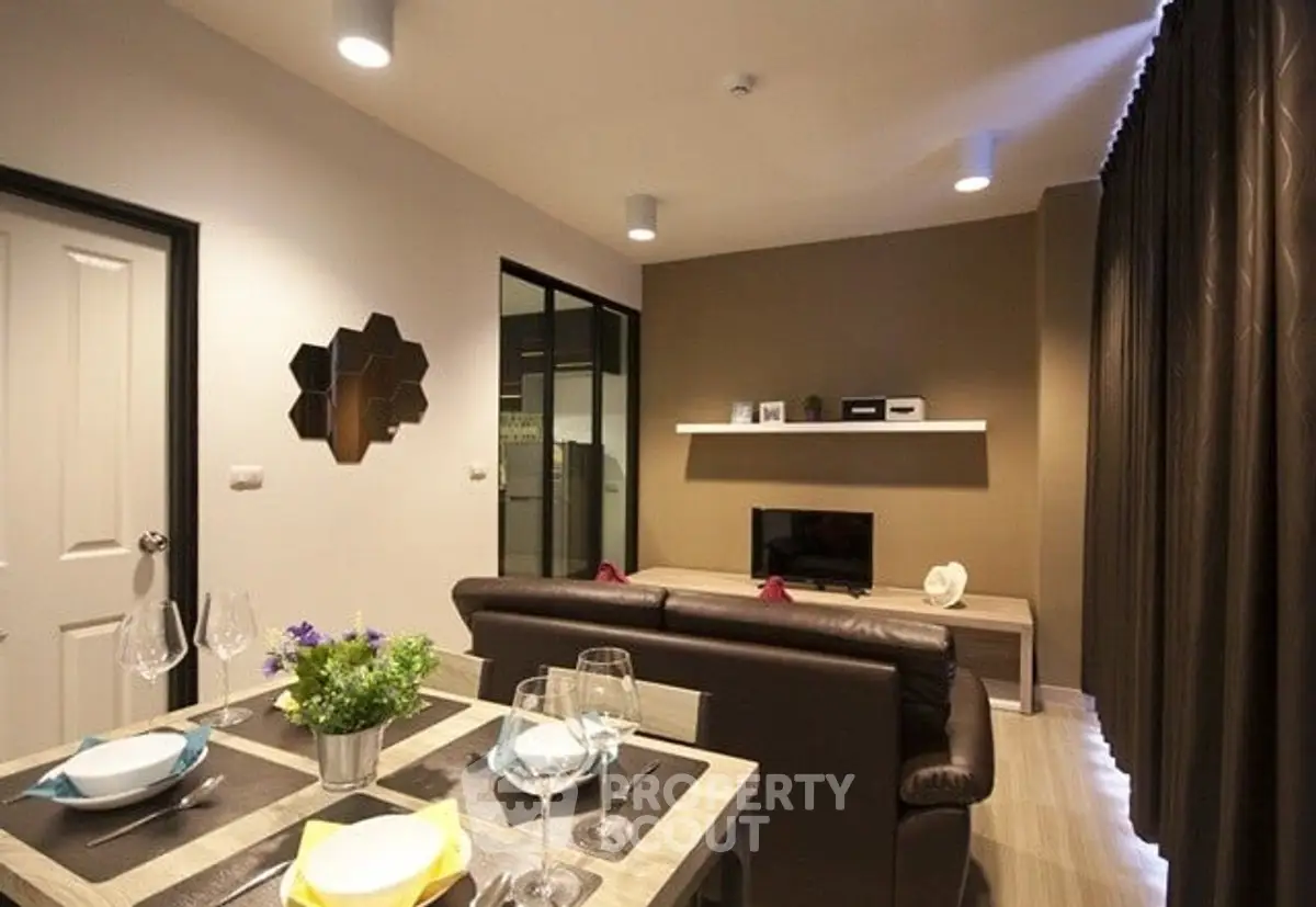 Modern living room with stylish decor and cozy ambiance, perfect for relaxation and entertainment.