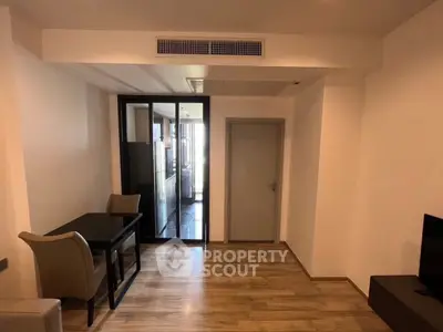 Modern apartment interior with dining area and sleek flooring