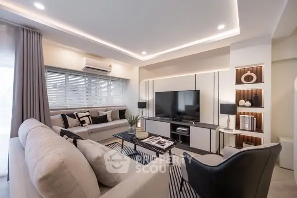 Modern living room with elegant decor and spacious seating area