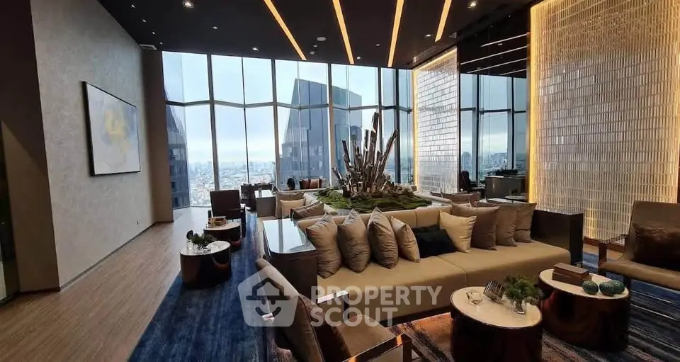 Luxurious modern living room with panoramic city views and elegant decor.