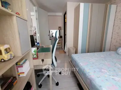 Charming bedroom with modern furniture and cozy decor, perfect for a comfortable living space.