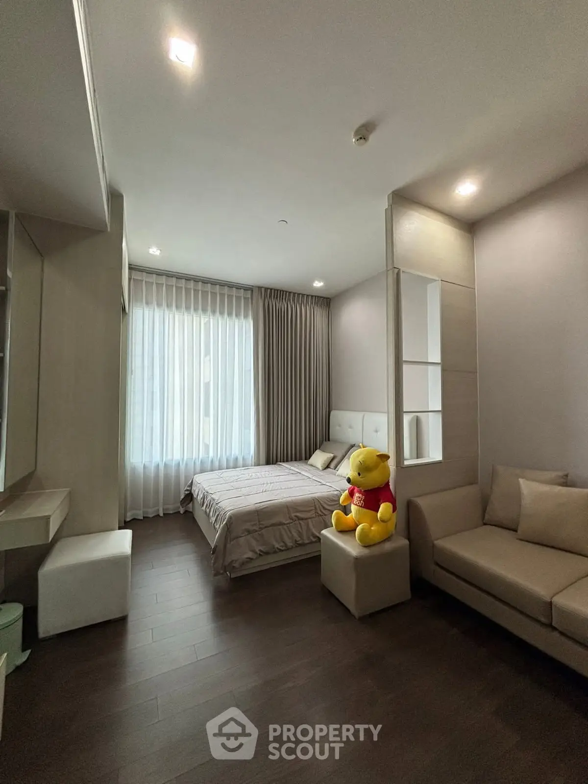 Modern bedroom with cozy decor and natural light