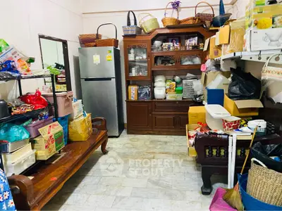 Cozy storage room with wooden shelves and ample space for organization.