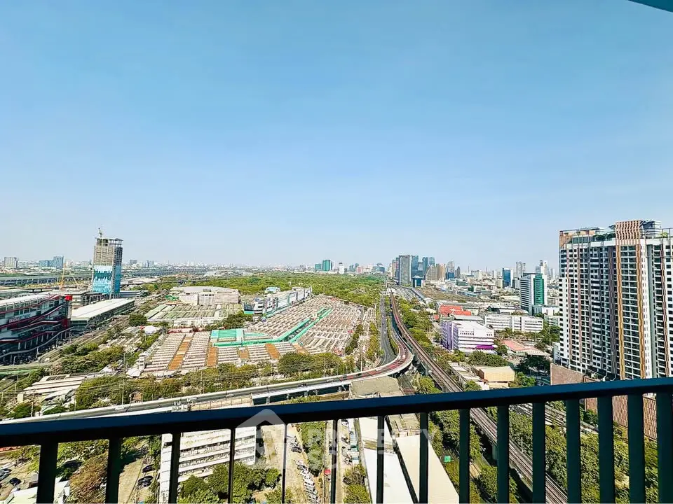Stunning cityscape view from high-rise balcony with expansive skyline and urban landscape.