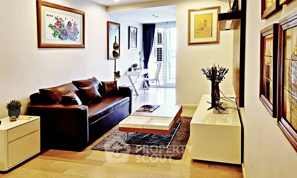 Stylish living room with modern decor and natural light, perfect for relaxation and entertaining.