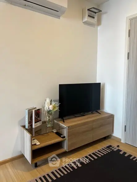 Modern living room with sleek TV stand and minimalist decor
