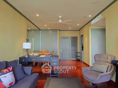 Spacious living room with modern decor and hardwood floors