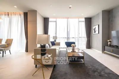 Luxurious modern living room with elegant decor and abundant natural light
