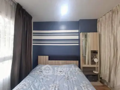 Cozy bedroom with modern decor and ample natural light