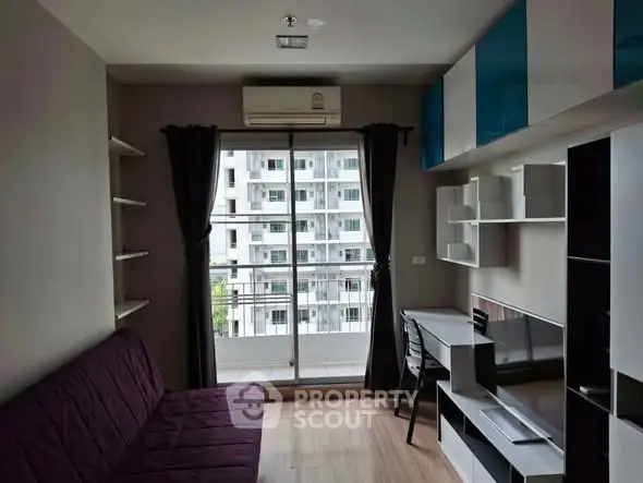 Modern living room with balcony view in urban apartment