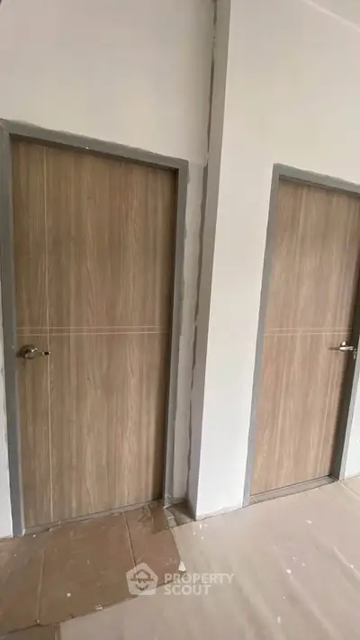 Modern interior doors with sleek wooden finish in a contemporary setting
