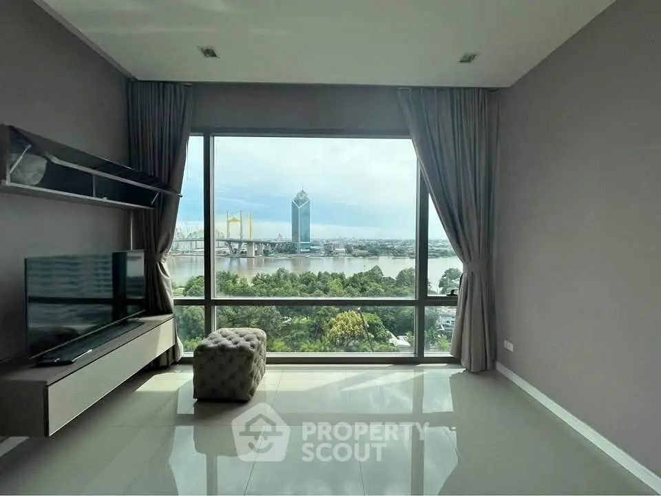 Luxurious living room with stunning river view and modern decor