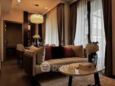 Luxurious living room with elegant decor and chandelier lighting