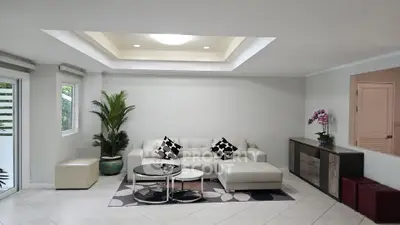 Spacious modern living room with elegant decor and natural light