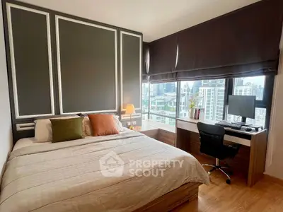 Modern bedroom with city view, featuring stylish decor and a cozy workspace.