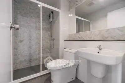 Modern bathroom with sleek shower and contemporary fixtures