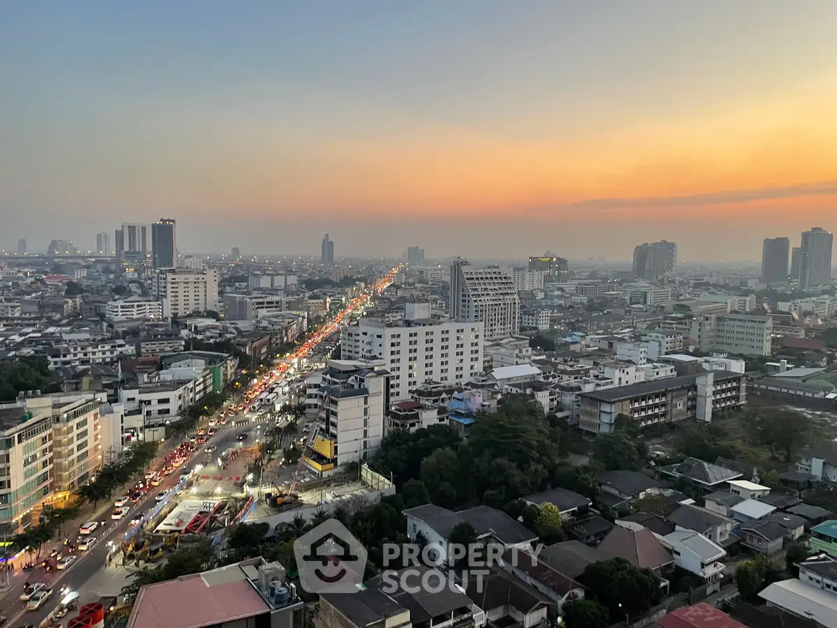 Stunning cityscape view at sunset with vibrant skyline and bustling streets.