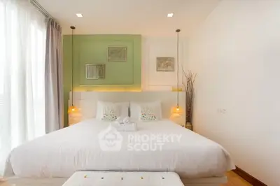 Elegant bedroom with modern decor and natural light