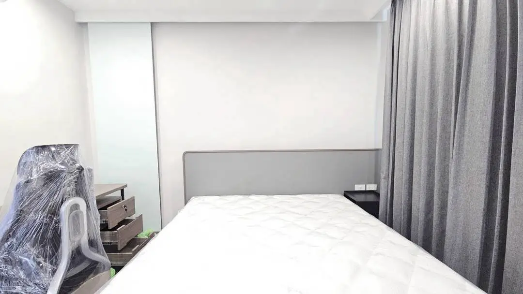 Modern bedroom with minimalist design and sleek furniture