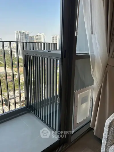 Modern apartment balcony with city view and sleek railing design