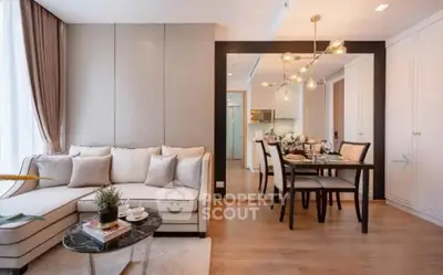 Elegant living and dining area with modern decor and cozy ambiance