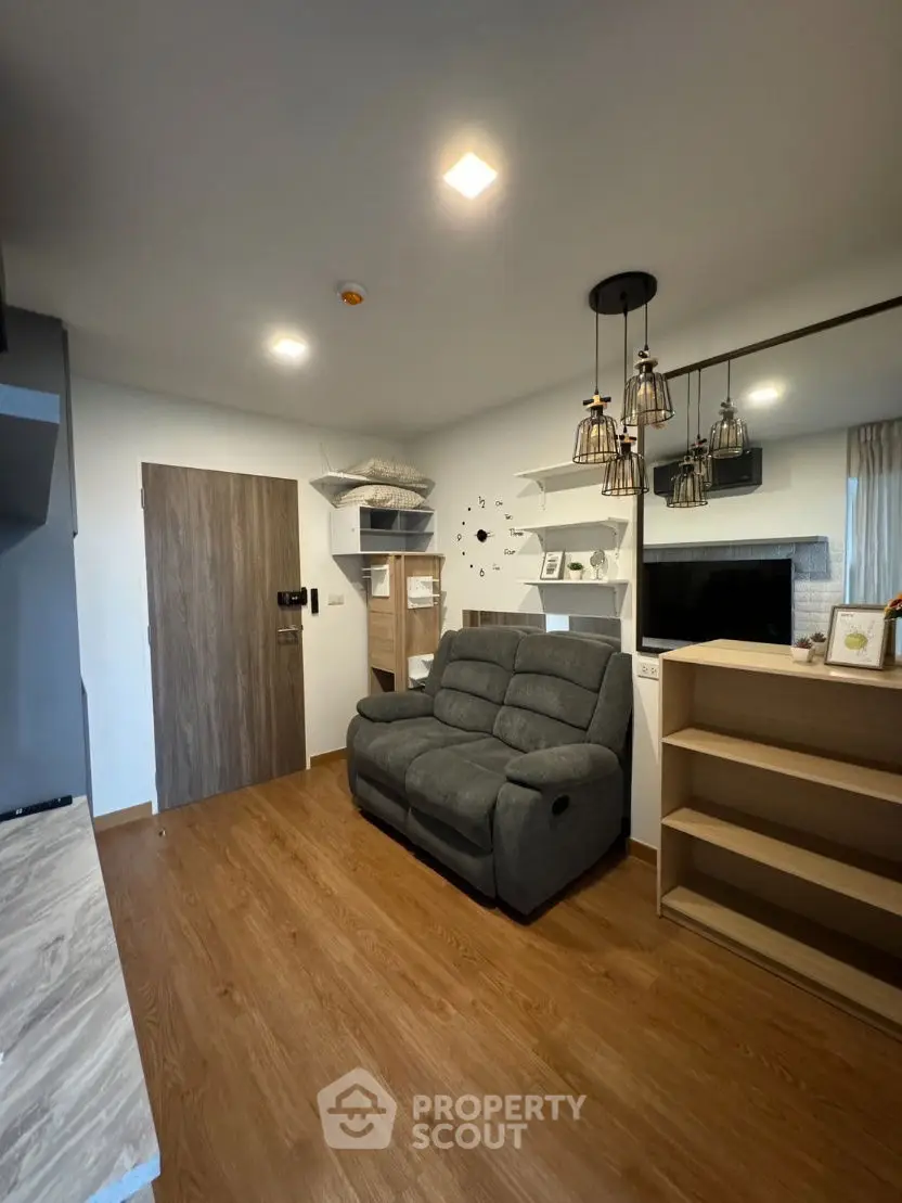 Modern living room with stylish lighting and cozy seating
