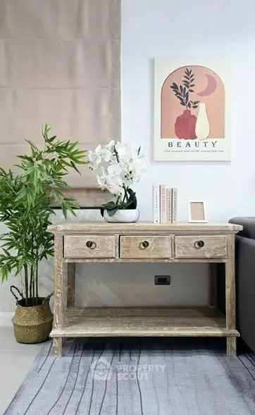 Stylish living room corner with rustic console table and elegant decor