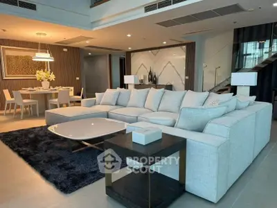 Luxurious modern living room with elegant dining area and stylish decor