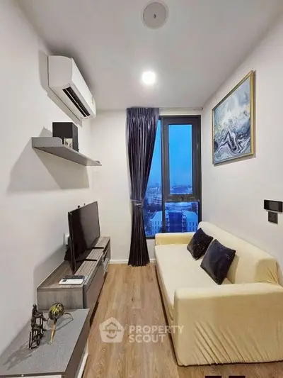 Modern living room with sleek design, featuring a cozy sofa, wall-mounted TV, and large window with city view.