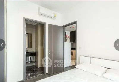 Modern bedroom with ensuite bathroom and sleek minimalist design