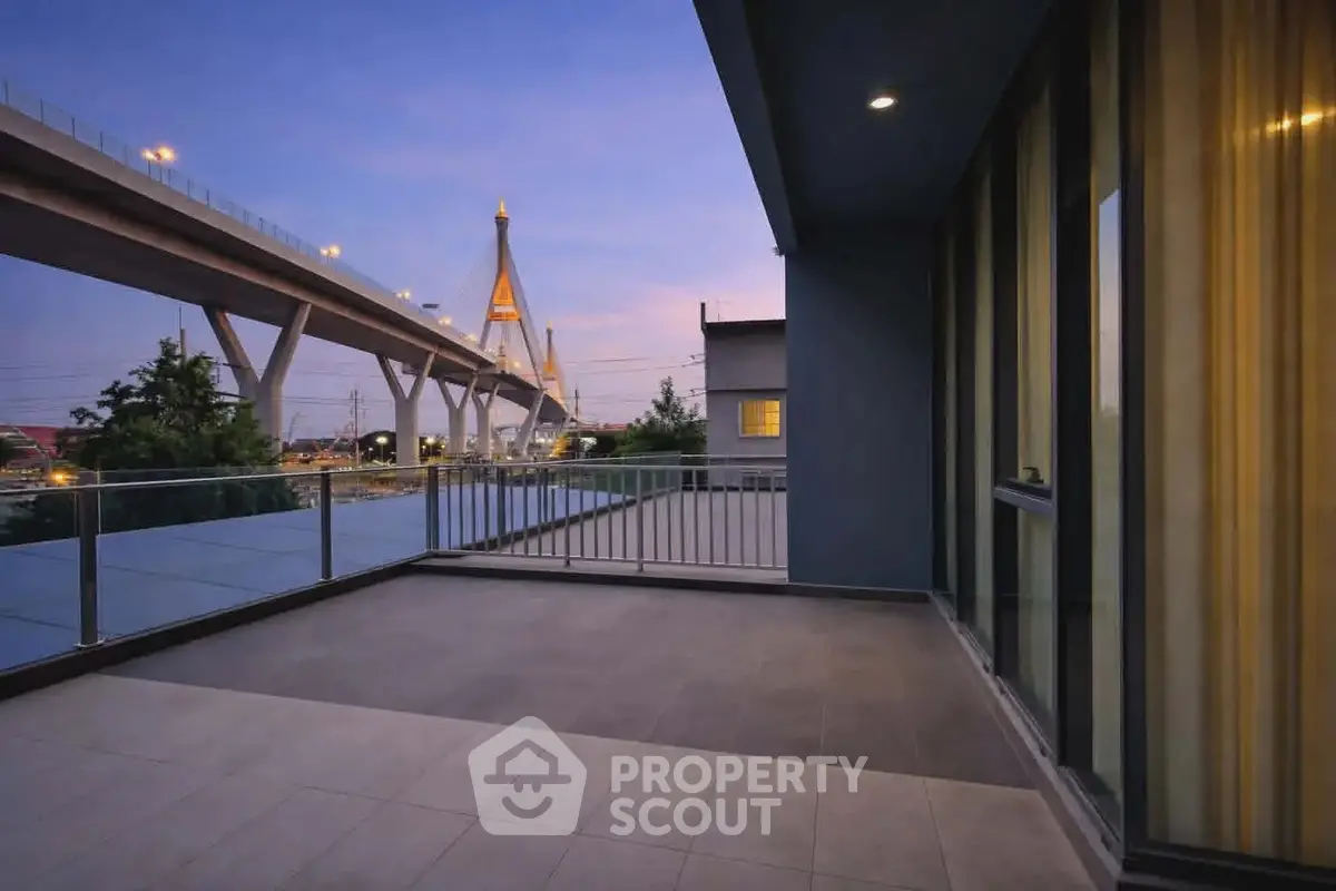 Spacious balcony with stunning city view and modern architecture