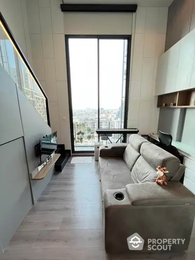 Modern living room with high ceiling and city view from large window